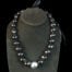 25 inch Black Kukui Nut Lei with 99% Pure Silver Plated Center Kukui