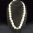 29 1/2 inch Natural Kukui Nut Lei with Large 24K Gold Plated Kukui Nut