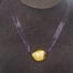 Single 24K Gold Plated Kukui Nut on a Black Satin Ribbon